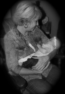 Rocking Baby Kaylee Photo taken by Amanda Shepard / Edited by Holly Smith 
